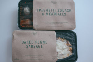 meal packages before being cooked 2 frozen meal packages